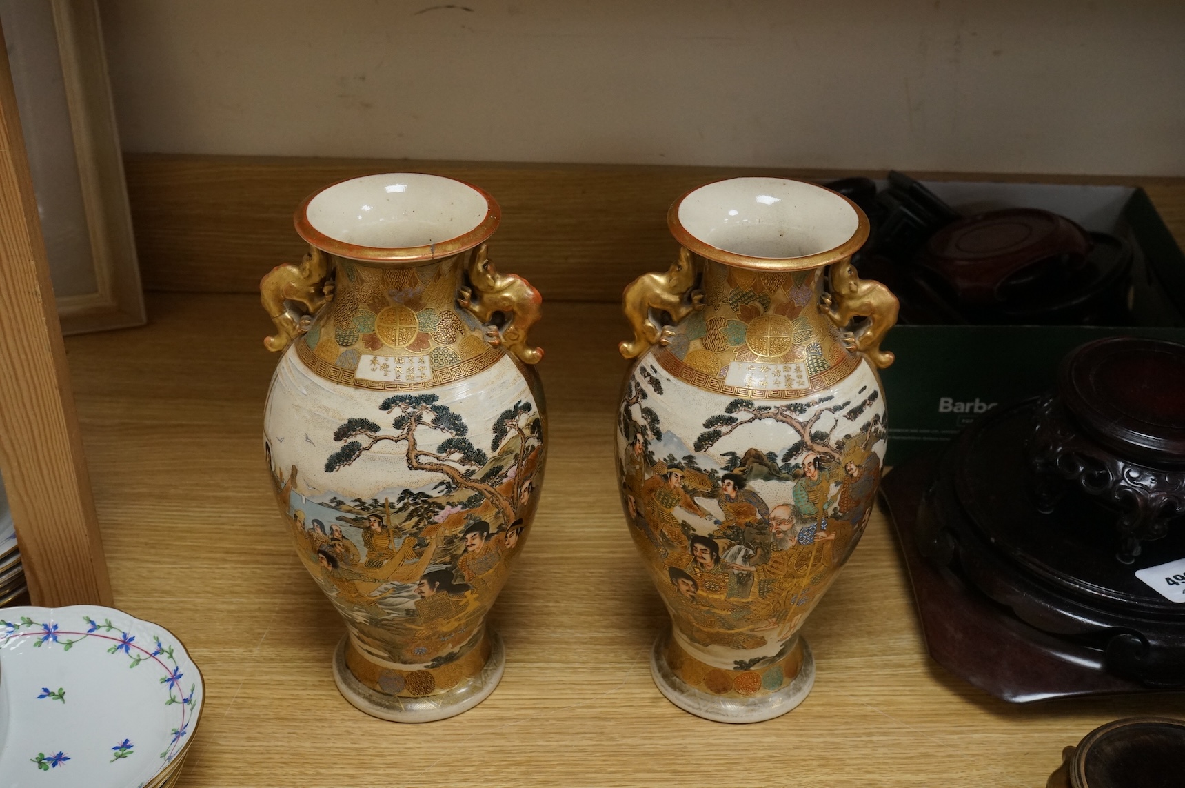 A pair of Japanese Satsuma pottery vases, Meiji period, 31cm high
